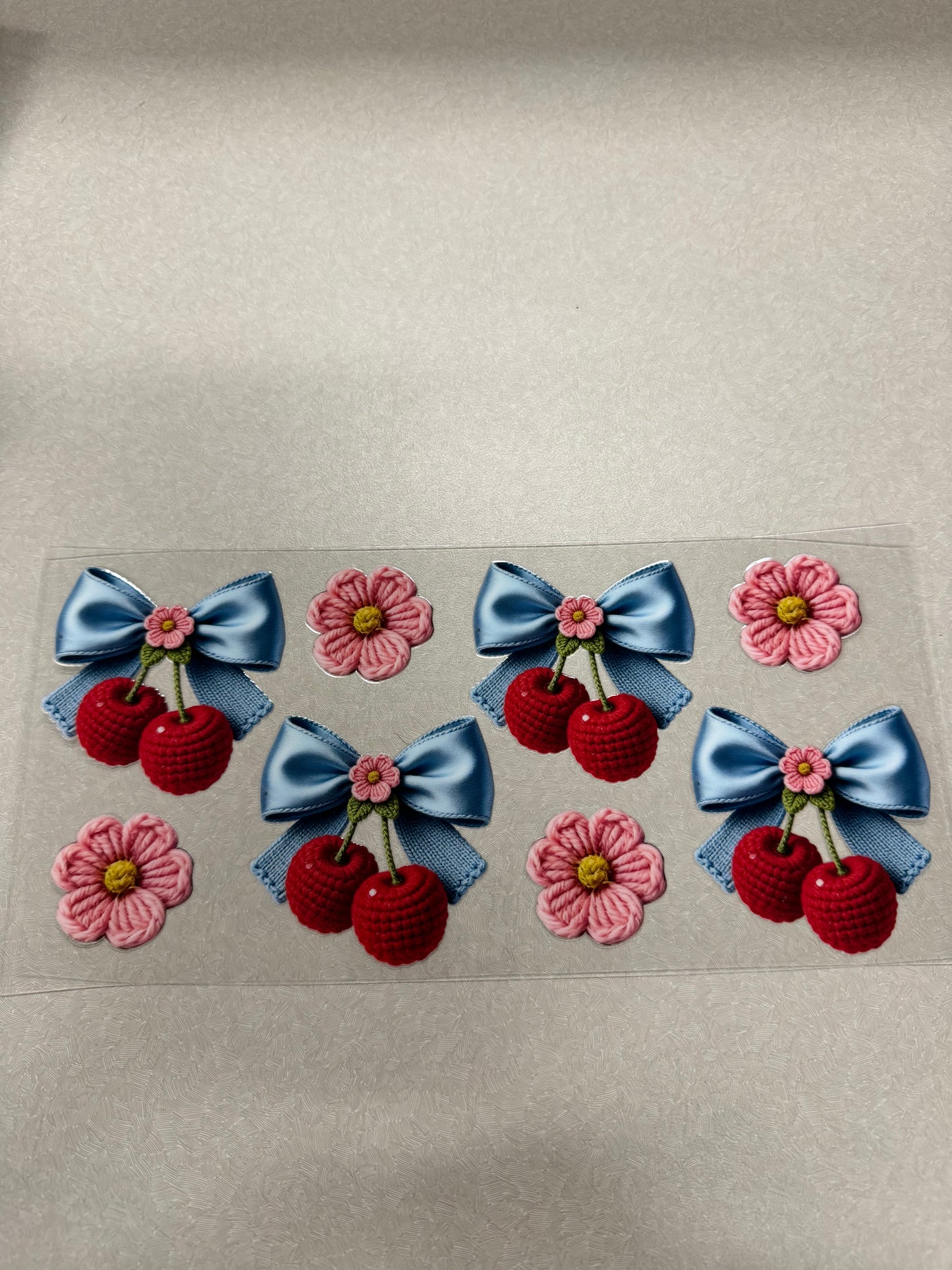 Cherries with blue bows